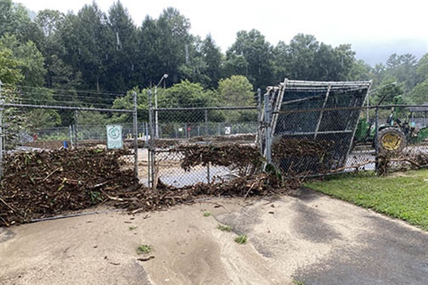 Debris on the fence around the raceways indicates how high the water rose