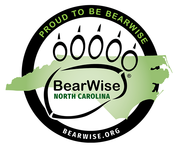 Bearwise North Carolina logo features a bear print reading BearWise North Carolina superimposed on a green map of North Carolina. The circular border reads Proud to be BearWise, bearwise.org